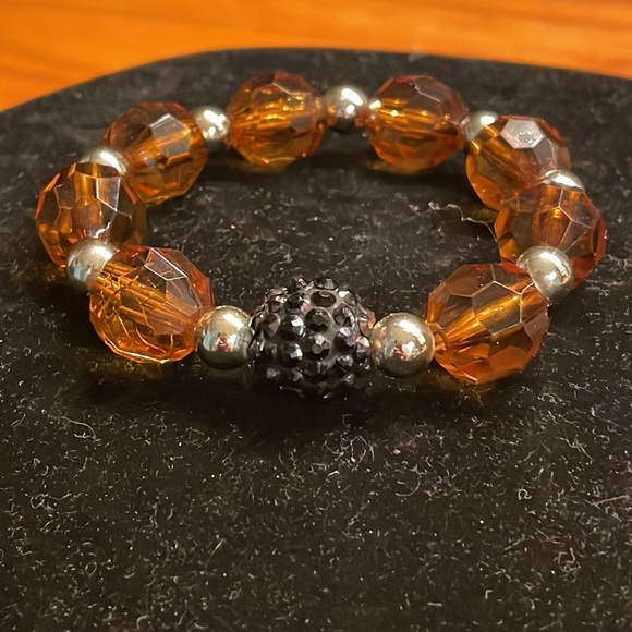 8” stackable stretch bracelet with 8 amber color & 9 silver tone beads - Picture 6 of 13